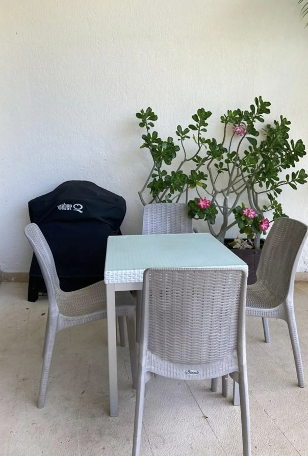 Outdoor dining with Weber grill on the private terrace of the apartment in Isla Mujeres